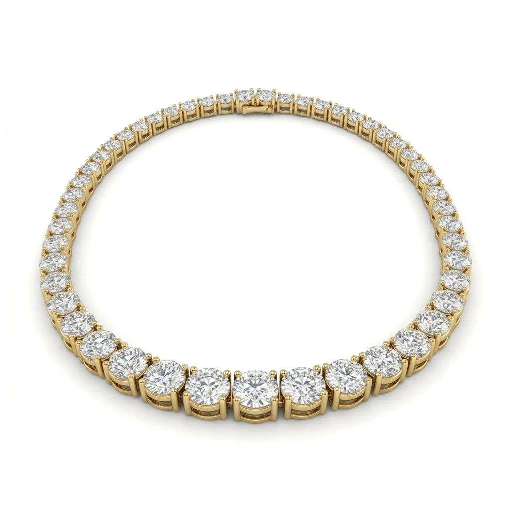 Graduated round brilliant diamond tennis necklace in 18k yellow gold on a white studio background